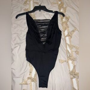 Victoria’s Secret black backless bodysuit.